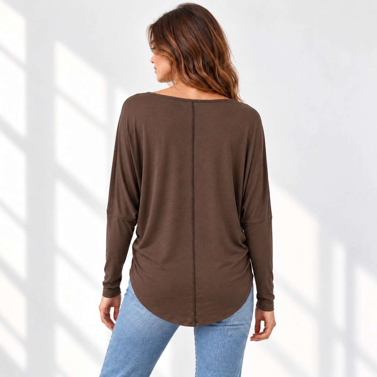 Relaxed Dolman Sleeve Top with Curved Back Hem