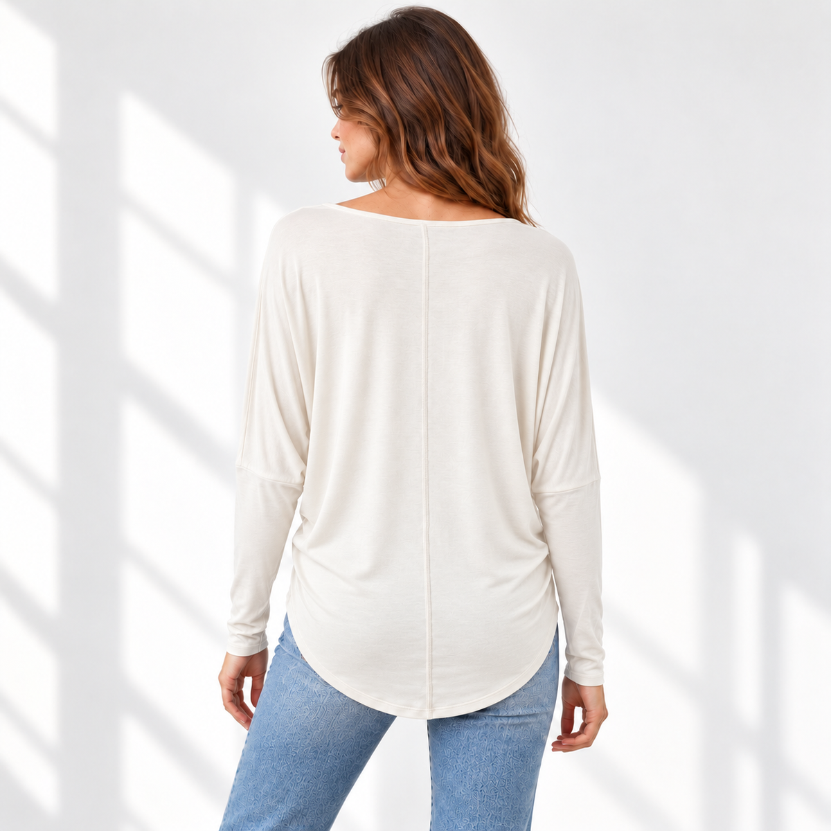 Relaxed Dolman Sleeve Top with Curved Back Hem